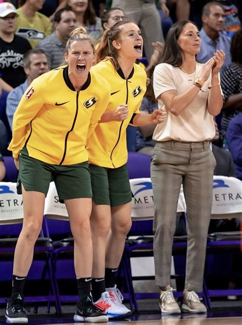 Seattle Storm Players Celebrating a Three-Pointer