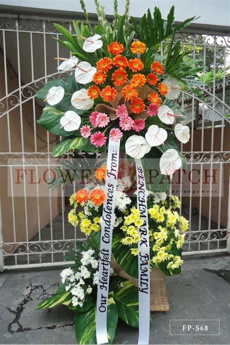 Standing Arrangement of White Anthuriums, Gerberas, Mums, and Tuberoses ...