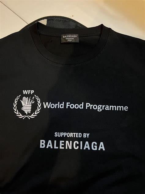 BALENCIAGA WORLD FOOD PROGRAMME, Men's Fashion, Tops & Sets, Tshirts ...