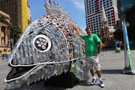 Mackay artist David Day designed a Fish Sculpture made from 4000 recycled cans and water bottles ...