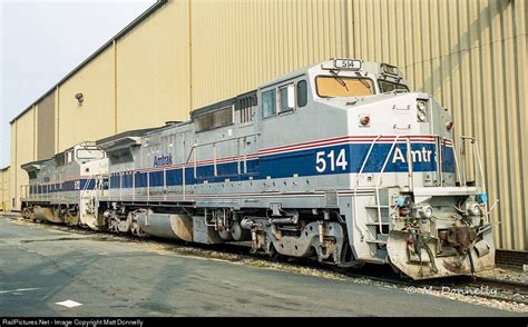 Two clean Phase IV Dash 8s sit outside the shops. Locomotive Engine, Electric Locomotive, Diesel ...