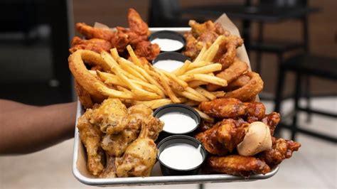 Buffalo Wild Wings Just Added New Flavors. Here's What You Need To Know