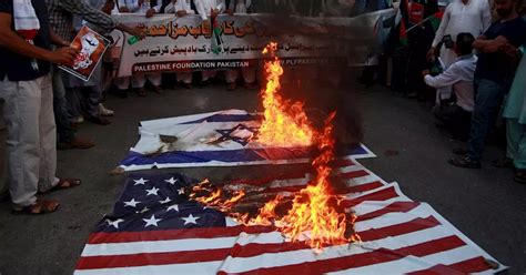 US and Israel flags burned across world as horror scenes show tensions ...