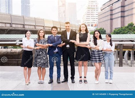 Business People Shaking Hands after Finishing Up a Meeting,Successful Diversity Group of ...