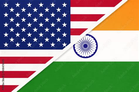 USA vs India national flag from textile. Relationship between two american and asian countries ...