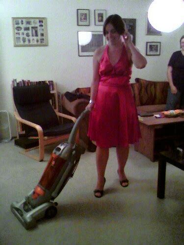 50s housewife | Erin, with nice dress and pearls, vacuuming | Theresa O'Connor | Flickr