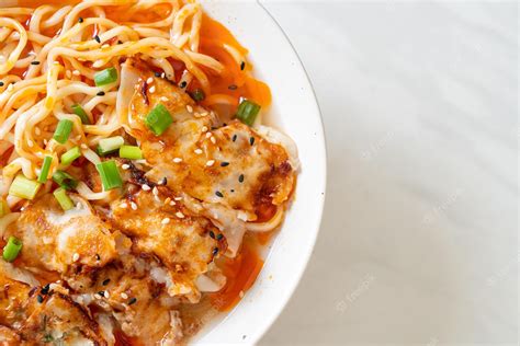 Premium Photo | Ramen noodles with gyoza or pork dumplings