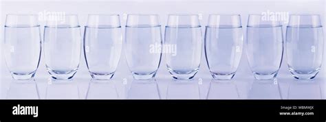 Eight glasses of water Stock Photo - Alamy