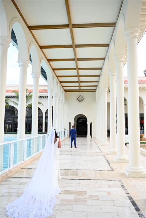 Bride and groom before the wedding ceremony in fantastic ambience of Paradisus Palma Real Resort ...