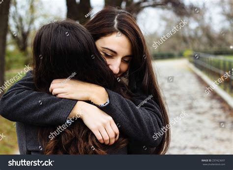 Girl Hugging Her Best Friend Stock Photo 237423697 - Shutterstock