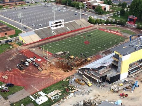 Huge sinkhole swallows part of Austin Peay State University football stadium | The Independent ...