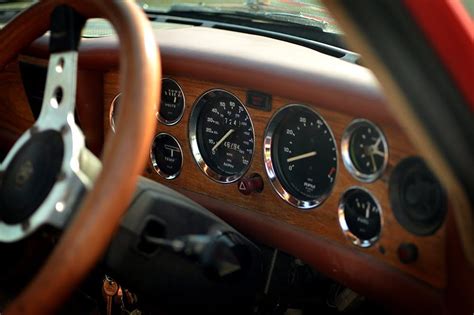 Triumph Stag interior. This one features a rosewood veneer dashboard, Mountney woodrim steering ...