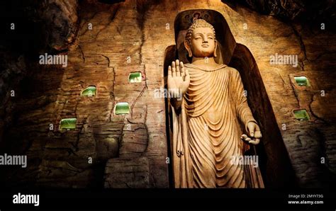 Buddha statue in Bamiyan cave on the grounds of Golden Mount Temple ...