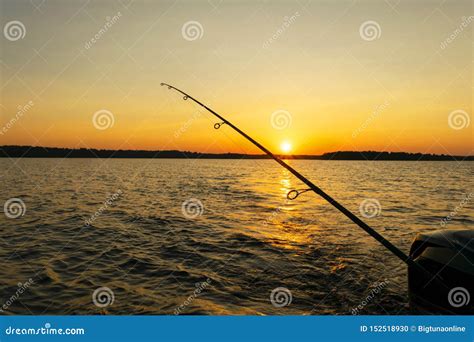 Fishing Rod Silhouette during Sunset. Fishing Pole Against Ocean at Sunset Stock Photo - Image ...