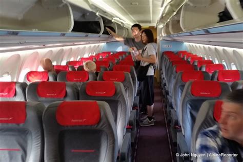 The economy cabin of an Austrian Airlines Fokker 100. : AirlineReporter