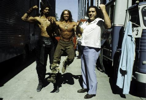 Arnold Schwarzenegger, Wilt Chamberlain, and Andre the Giant on the set ...