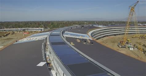 Stunning new drone footage offers sneak peek at Apple's 'Spaceship' campus - http://howto.hifow ...