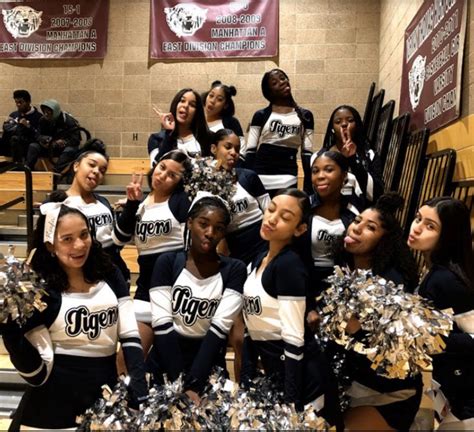 Murray Hill Academy on Twitter: "Our cheerleaders supporting the Tigers as they earn a victory ...