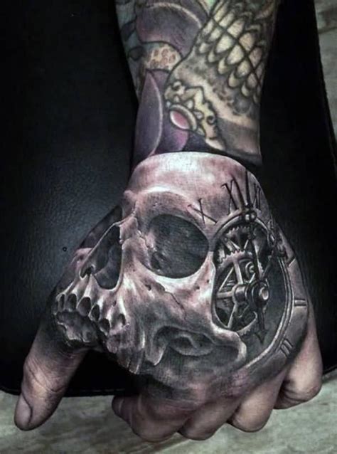 50 Skull Hand Tattoo Designs with Meaning | Art and Design