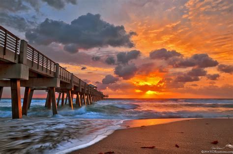 Dramatic Sunrise over Juno beach Fishing Pier | Justin Kelefas Fine Art Photography