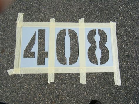 How to stencil parking lot identification numbers | MyParkingSign.com Blog