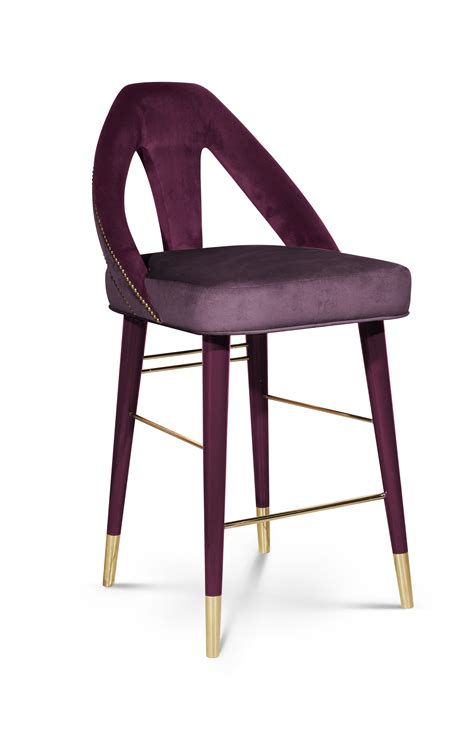 The Caron Mid-Century Modern Bar Chair has legs lacquered in high gloss varnish and a cotton ...
