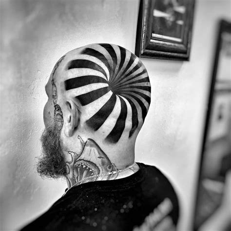 Bold Head Tattoo Doubles as a Mind-Bending Optical Illusion