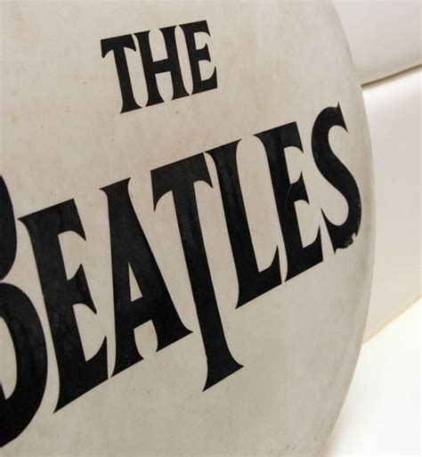 The Interesting History Behind The Beatles Logo