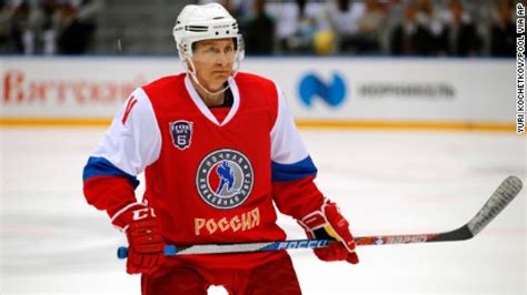 Vladimir Putin boosts action-man image with ice hockey match - CNN