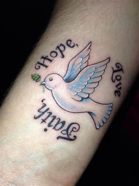 white dove peace bird and inscription #tattoo on hand | Faith hope love tattoo, Dove tattoos ...