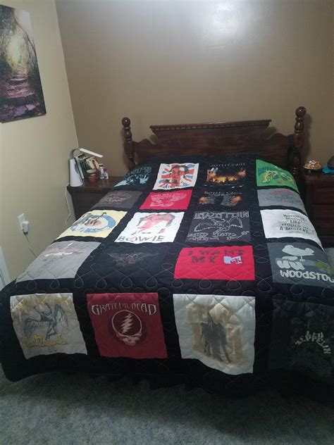 Quilt I had made from my favorite old T-shirts. : r/quilting