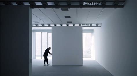 CASE-REAL installs movable walls inside a basement art gallery in tokyo - YouTube