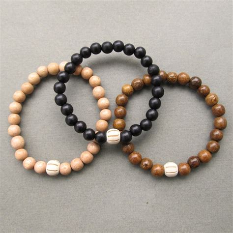 Wooden Beaded Bracelets With Carved Bead - Choose Your Colour | Jewellery by Lowusu