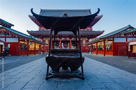 Japan. Tokyo. Asakusa Temple. Bowl for washing hands on the background of the Sensoji Temple ...