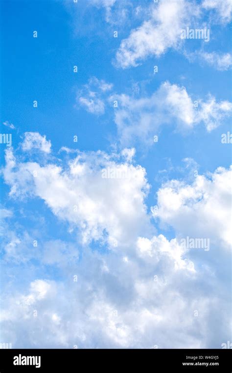 Blue sky background and fluffy white large cloud in sunny day Stock Photo - Alamy