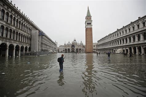 In Pictures: Venice flooded by record-high tide | Italy | Al Jazeera