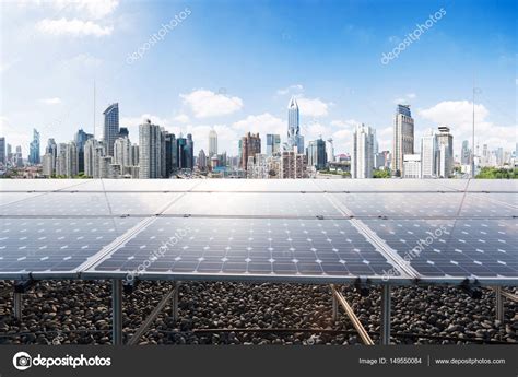 Solar panels with cityscape of modern city — Stock Photo © zhudifeng ...