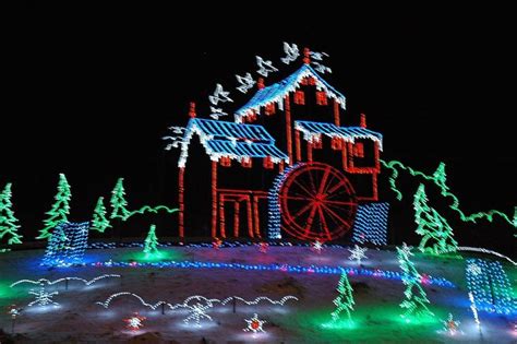 A Winterfest lights display depicting the Old Mill in Pigeon Forge. | Smoky mountain christmas ...