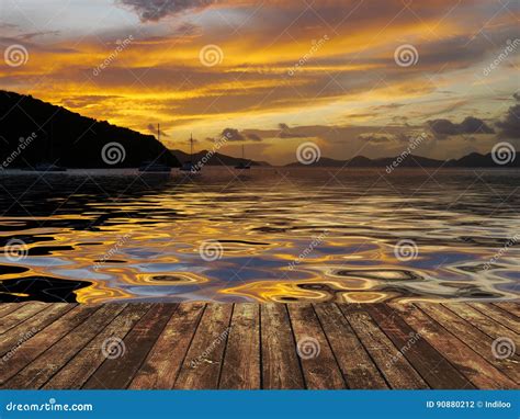 Wooden dock at sunset stock photo. Image of coastal, harbour - 90880212