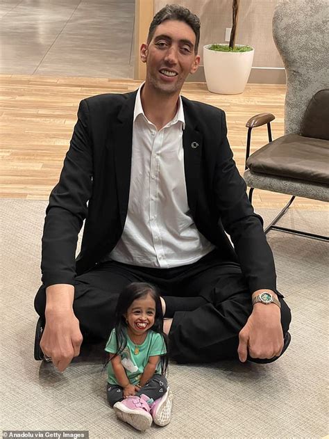 Height is but a number! World's tallest man reunites with the world's shortest woman six years ...