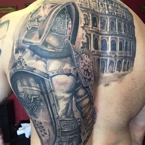 Breathtaking very detailed whole back tattoo of gladiator warrior with Roman arena ...