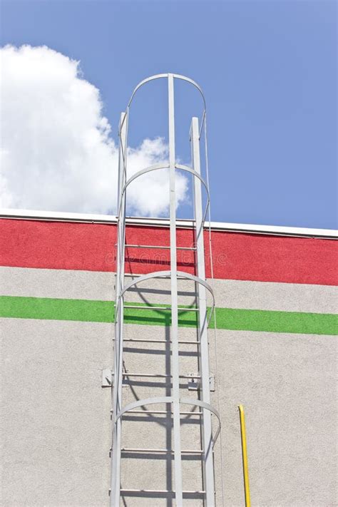 Safety Metal Ladder To the Roof Stock Image - Image of exterior, wall: 78370941