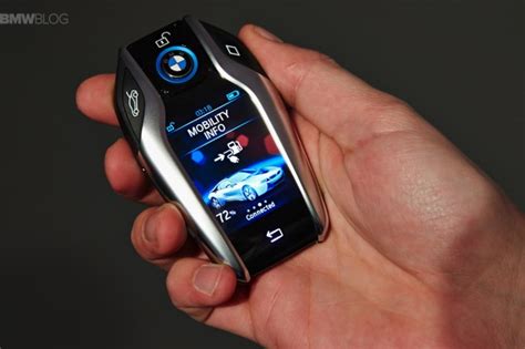 CES 2015| BMW Upgraded The i8’s Key Fob With A Touchscreen - TechDrive