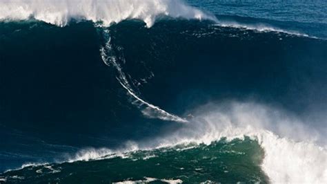 Garrett McNamara Photographed Surfing Possible 100-Foot Wave - ABC News