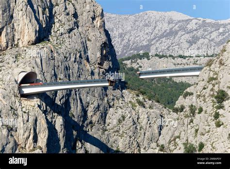 Unfinished bridge in Omis, Croatia over the river Cetina. Bridge being built in between the ...