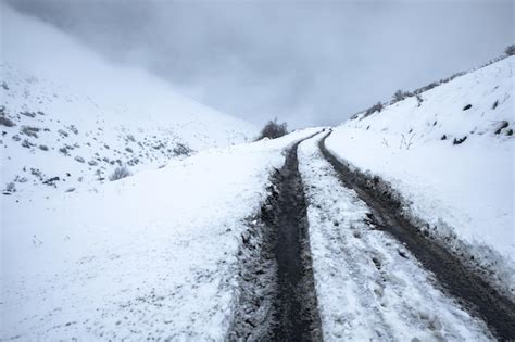 Premium Photo | Road on snowy mountain