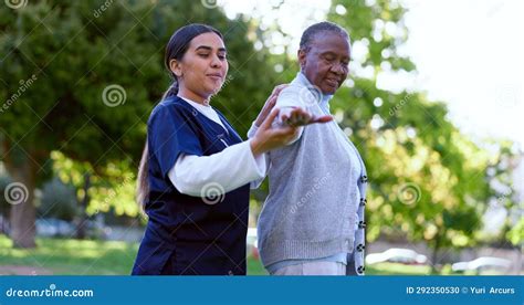 Elderly, Black Woman and Nurse with Stretching for Exercise, Wellness and Physiotherapy Outdoor ...