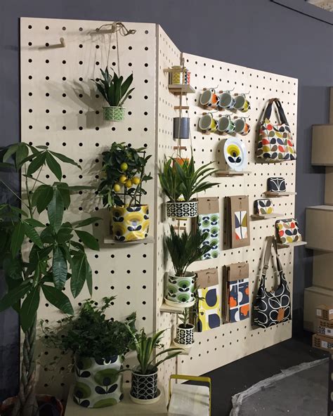 Our birch plywood custom pegboards for the design trade show stand of Wild&Wolf featuring Orla ...