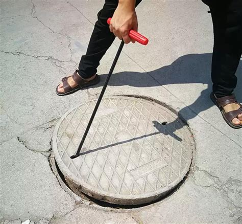 Manhole tool hook