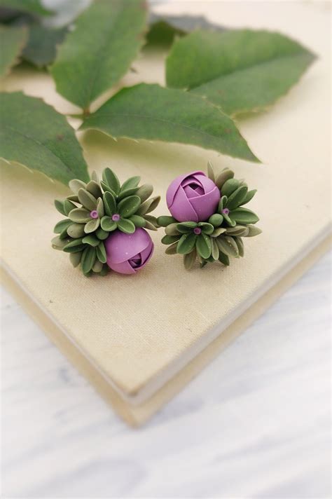 Tiny flowers stud earrings. Studs with purple ranunculus and | Etsy in 2021 | Polymer clay ...